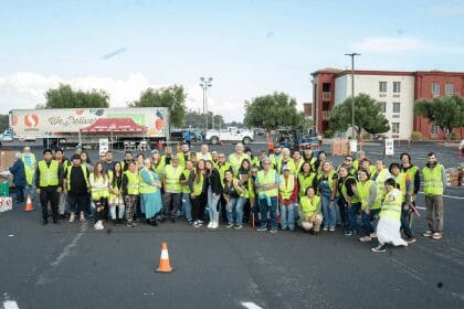 Group photo of members at food drive event