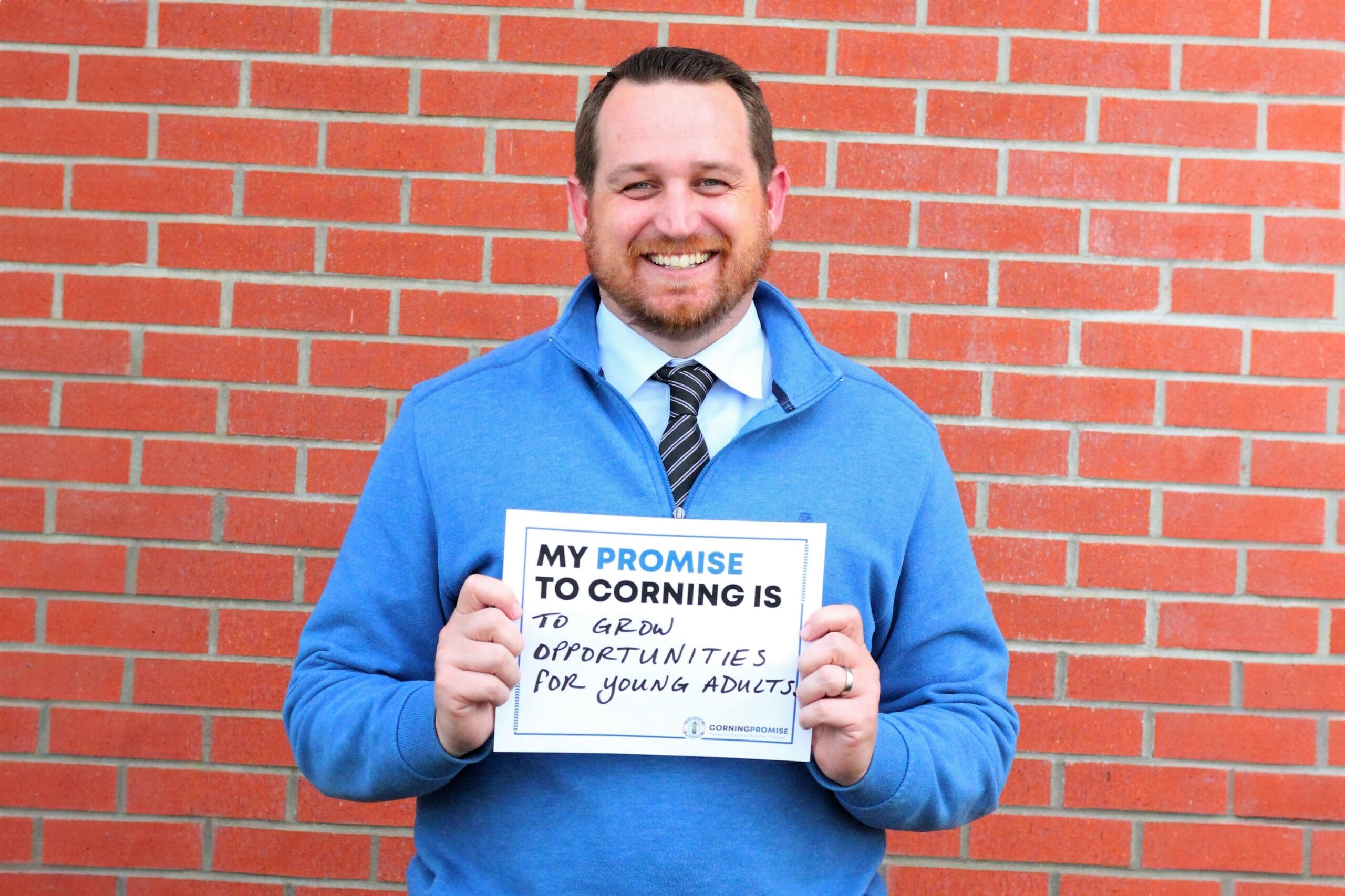 Man holding a sign